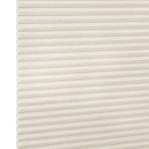 Off-white cellular (honeycomb) shade with evenly spaced horizontal pleats, lowered and closed, filtering soft light; textured linen-like fabric visible against a neutral bright background with no room details.