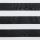 Horizontal zebra roller blind with alternating wide black wood-grain textured and white translucent bands; bands partially filter light, shown in a close-up indoor view with neutral, even lighting.