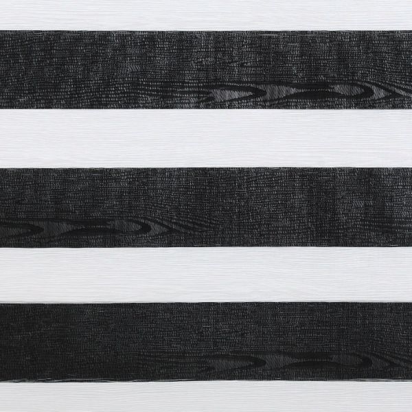 Horizontal zebra roller blind with alternating wide black wood-grain textured and white translucent bands; bands partially filter light, shown in a close-up indoor view with neutral, even lighting.