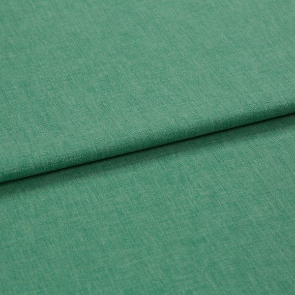 Green woven fabric folded over itself, forming a horizontal overlap; close-up studio view with even lighting and a subtle heathered texture.