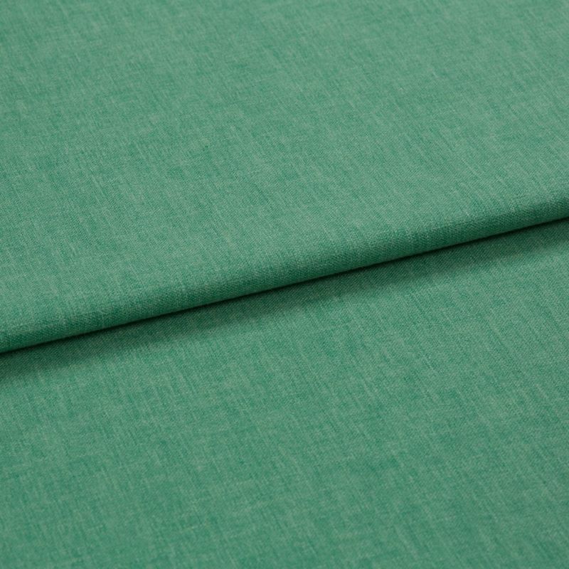 Green woven fabric folded over itself, forming a horizontal overlap; close-up studio view with even lighting and a subtle heathered texture.