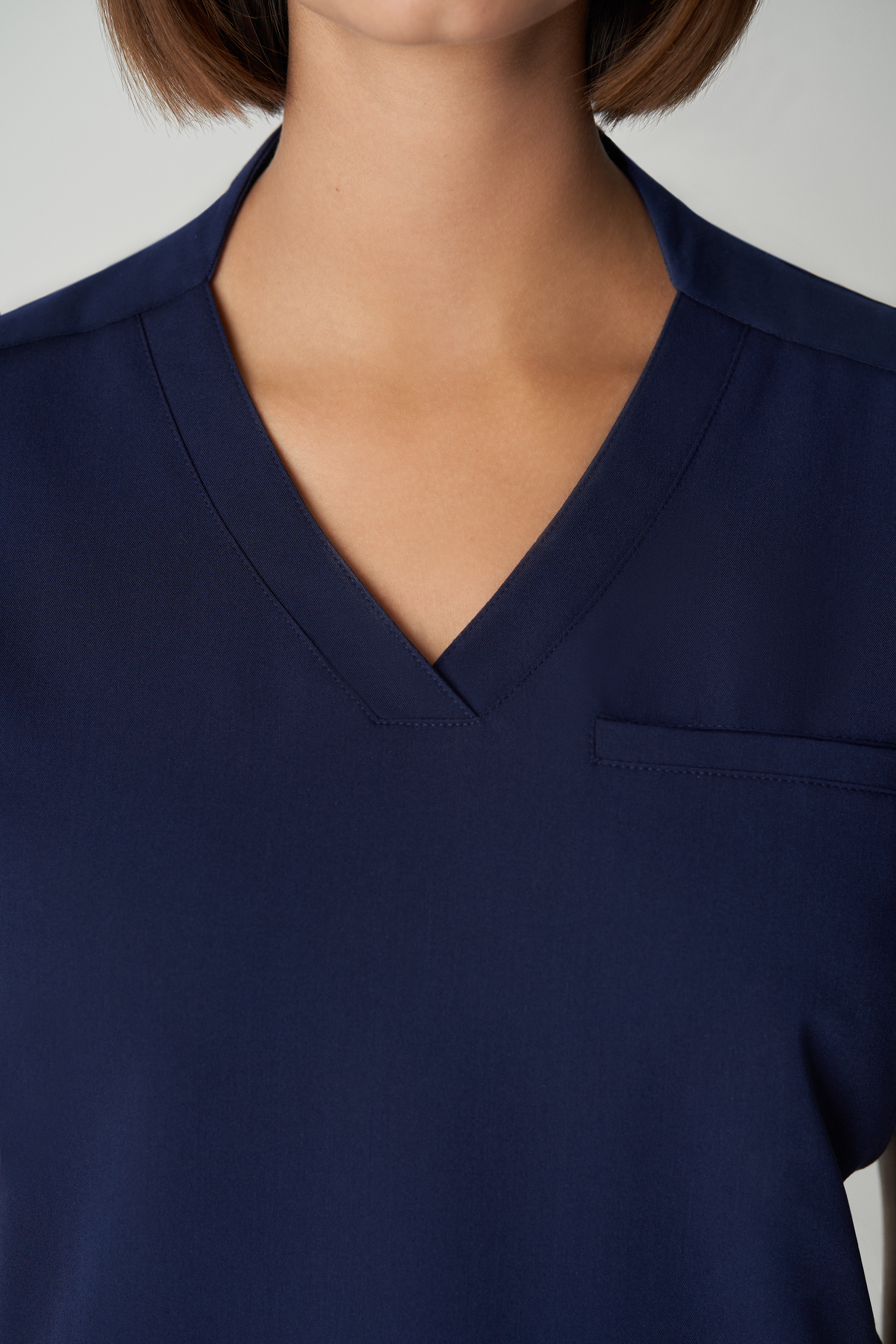 White Cross V-Tess Women&#8216;s 2-Pocket V-Neck Scrub Top-White Cross