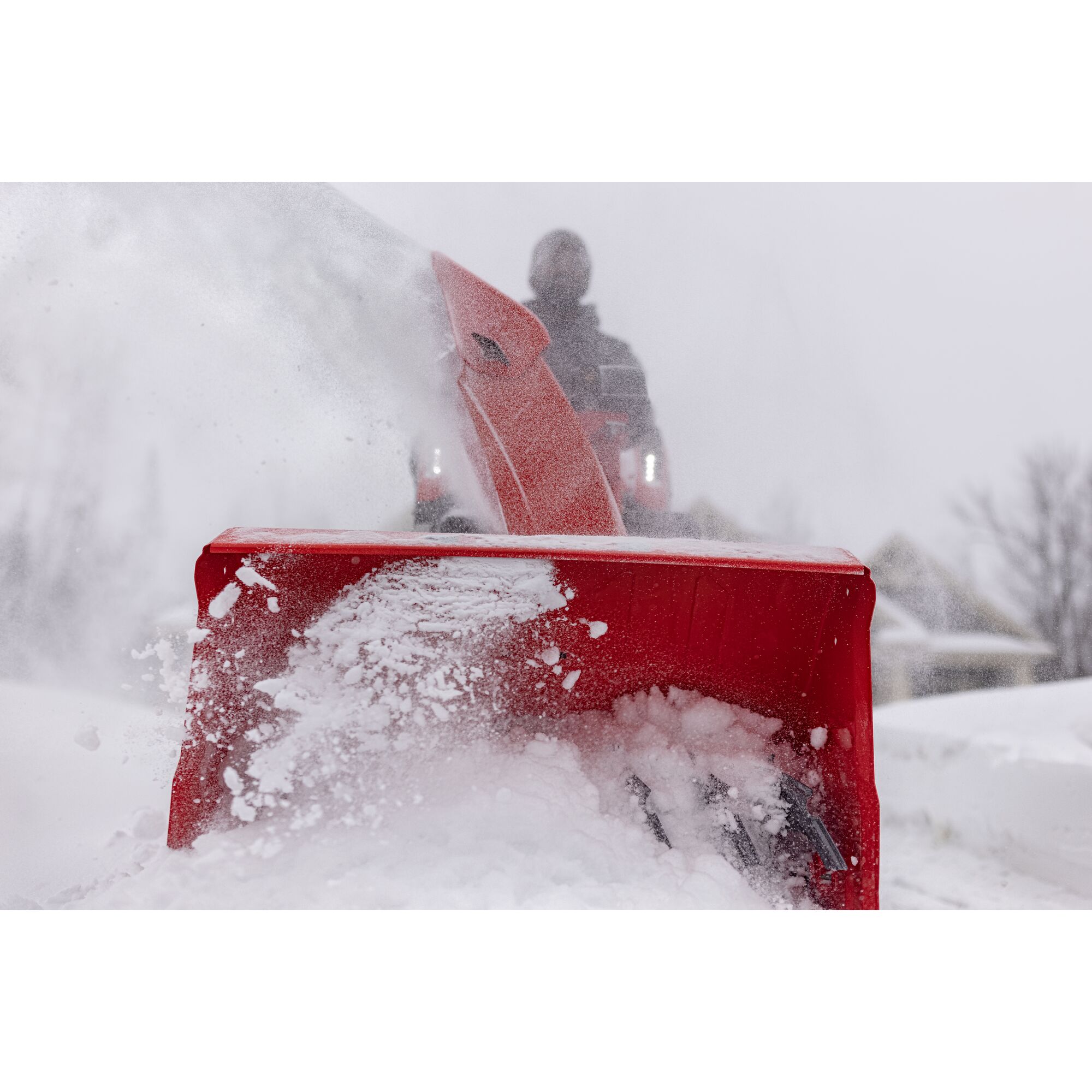 CRAFTSMAN Performance 30 Gas Snow Blower clearing driveway house to the left