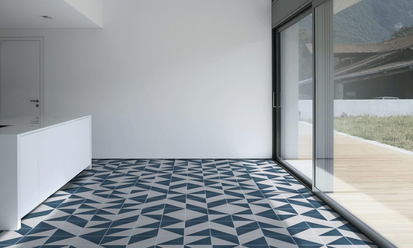 a blue and white tiled floor in a modern home.