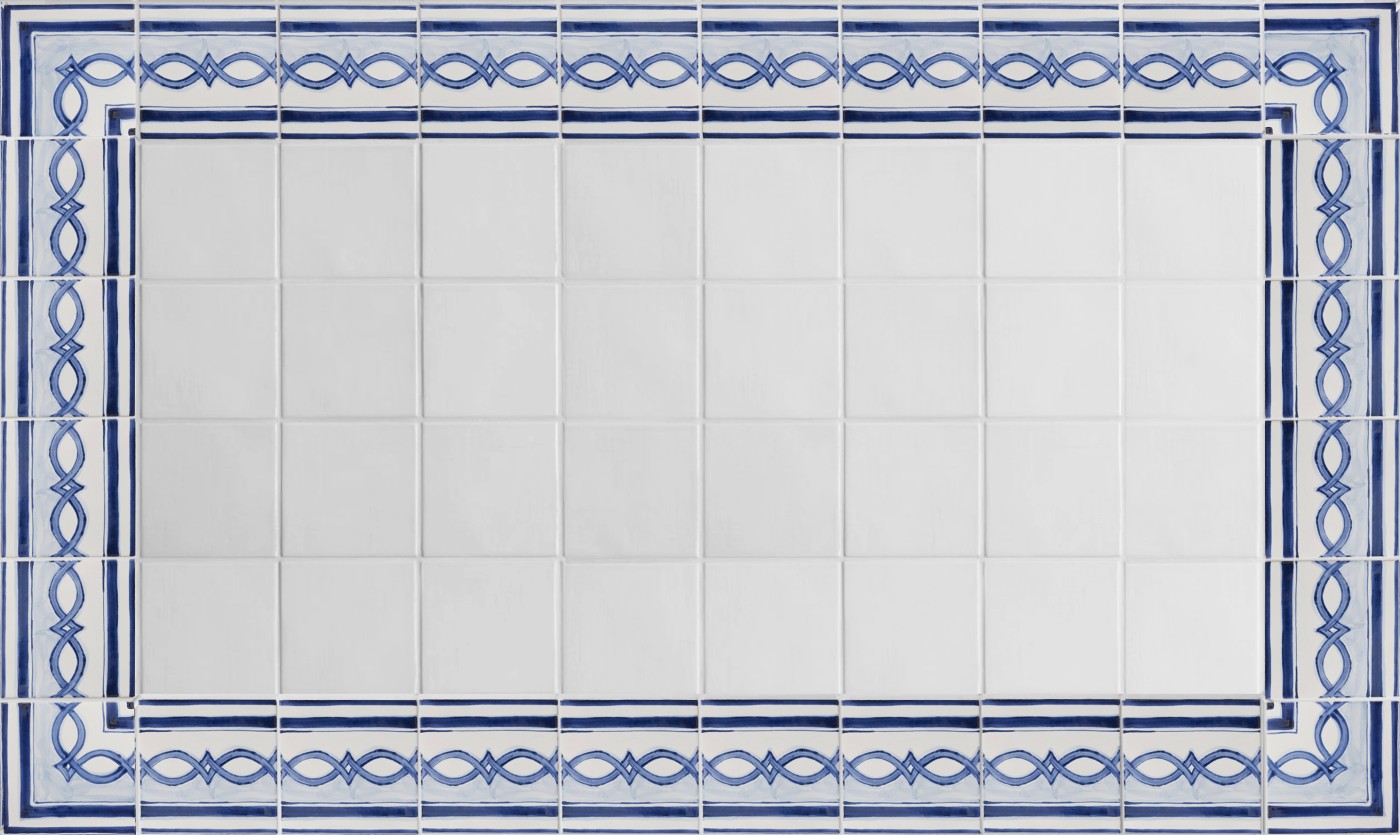 a group of blue and white tiles with an ornamental border arragement.