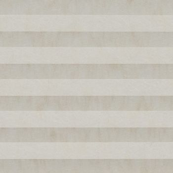 Beige pleated cellular shade, fully lowered with alternating horizontal bands and subtle texture; closed, softly diffusing daylight across a neutral interior wall.