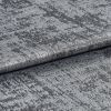Textured metallic silver fabric folded and layered, its crushed, variegated pile shimmering and reflecting light; close-up studio view with soft lighting and a neutral background.