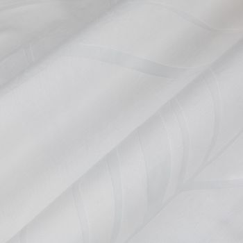 Sheer white curtain panels hung closed, satin-striped with subtle leaf-wave motifs, layered and slightly folded — filtering soft daylight in a bright, minimal interior setting.