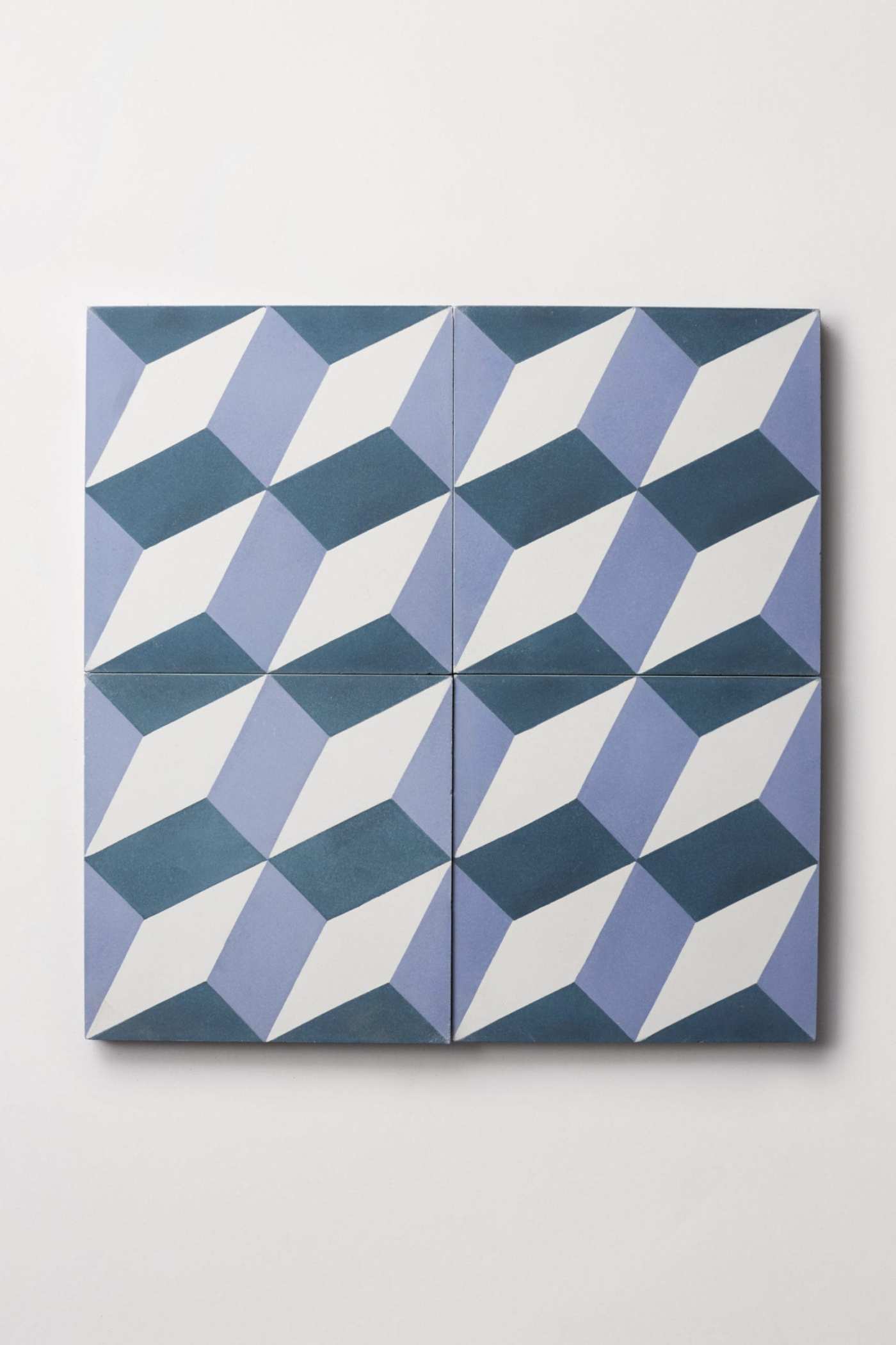 a set of tiles with blue and white geometric designs.