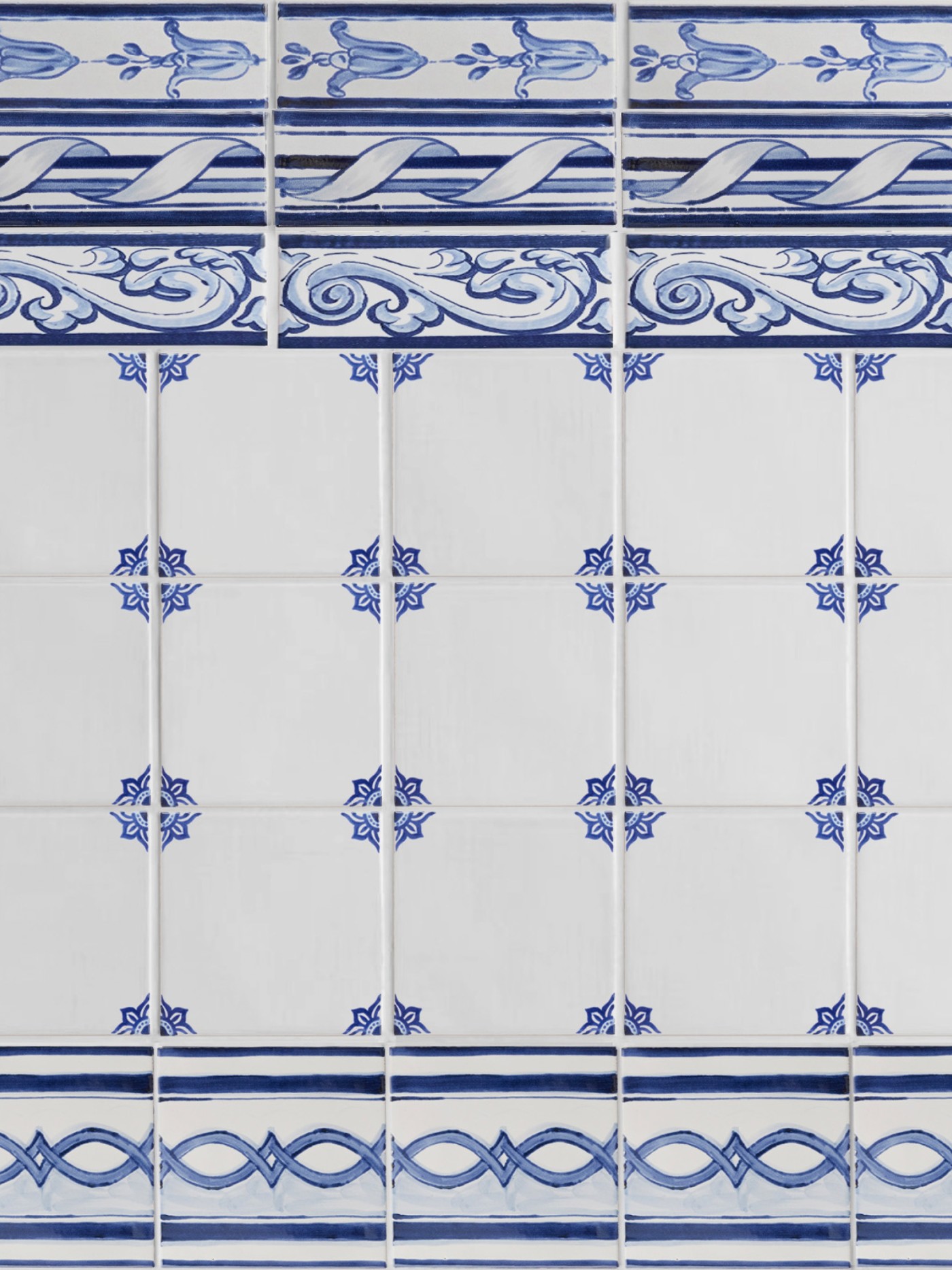 blue and white delft tiles with decorative designs.