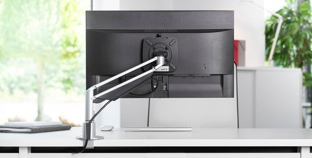 Novus Monitor Arms are highly adjustable, save space by elevating monitors off the work surface, and offer a variety of models to suit any work environment.