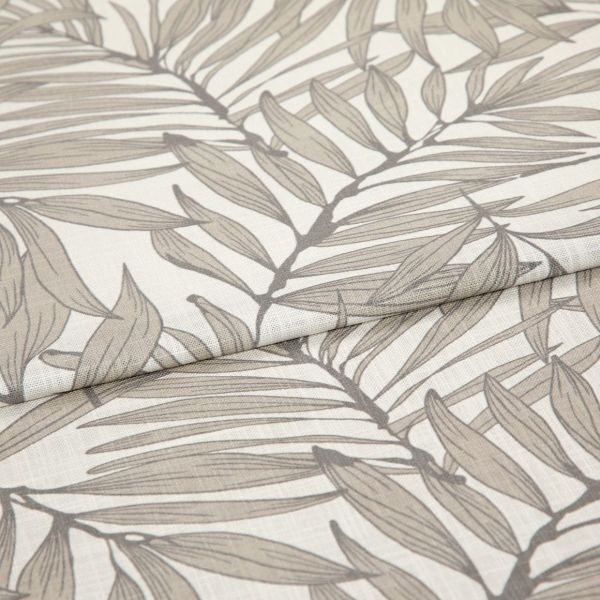 Folded curtain fabric with taupe botanical leaf print, linen-like texture, partially overlapped; close-up studio view showing neutral tones and soft, even lighting.