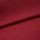 Burgundy satin fabric, folded diagonally with a soft sheen and smooth texture; fold casts a subtle shadow, close-up on a flat surface under even studio lighting.