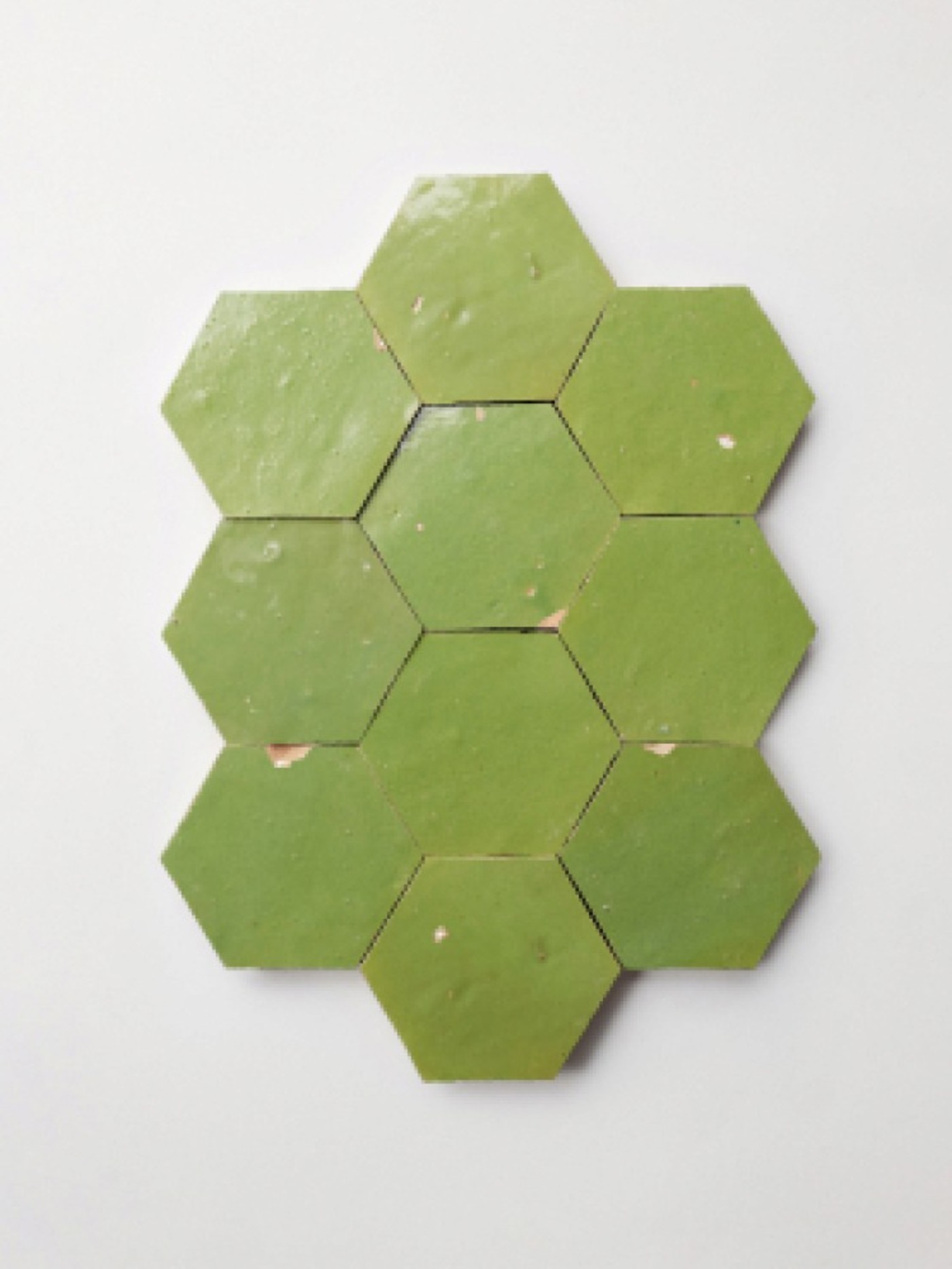 green hexagon tiles on a white background.