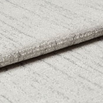Light-gray textured fabric panel with subtle vertical stripes and stitched horizontal fold â€” folded over to form a crisp edge â€” close-up view with soft, even lighting on a neutral surface.