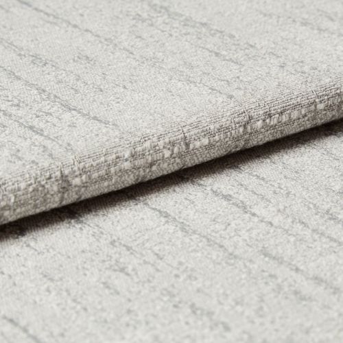 Light-gray textured fabric panel with subtle vertical stripes and stitched horizontal fold â€” folded over to form a crisp edge â€” close-up view with soft, even lighting on a neutral surface.