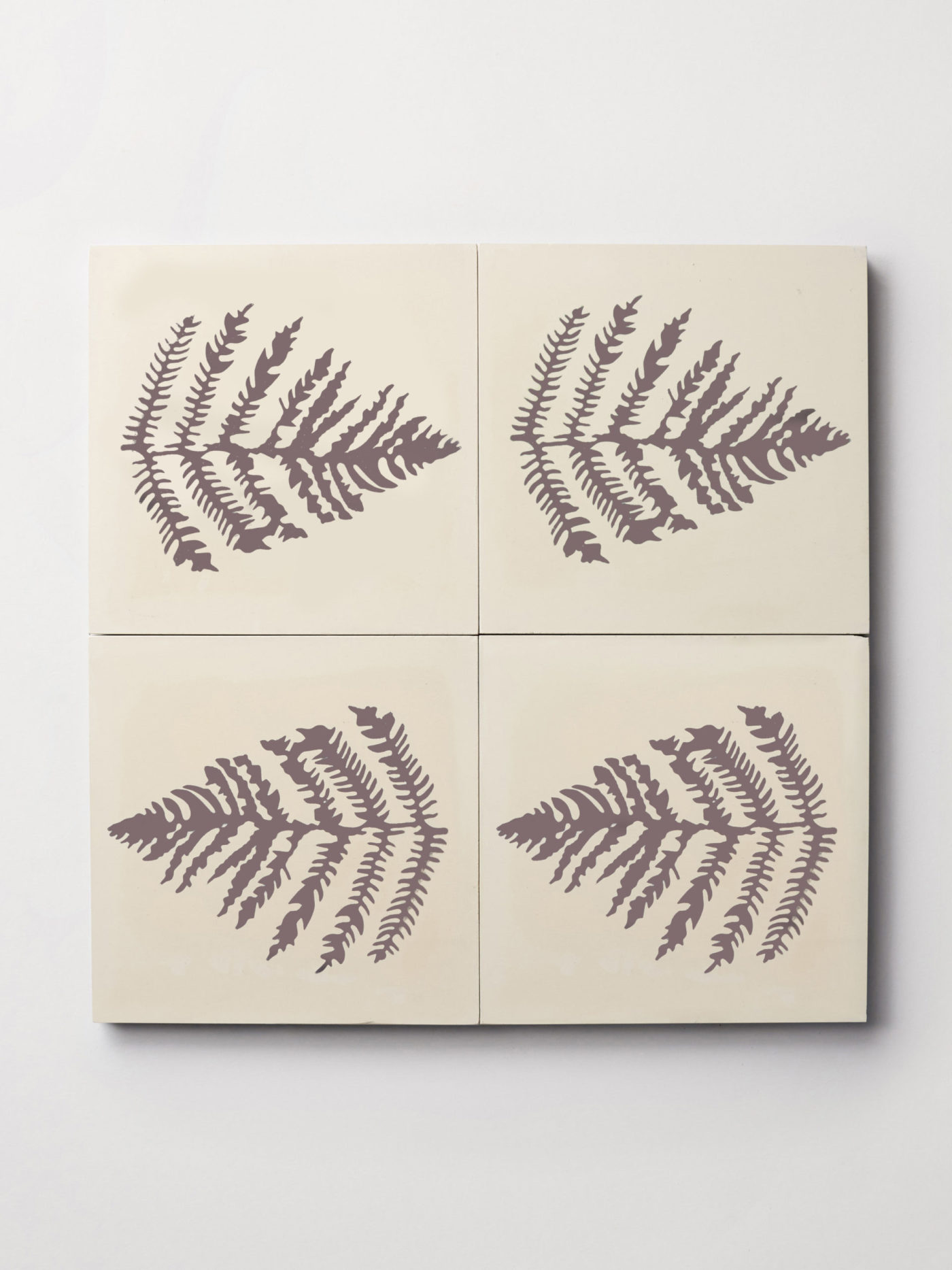 four fern tiles on a white background.