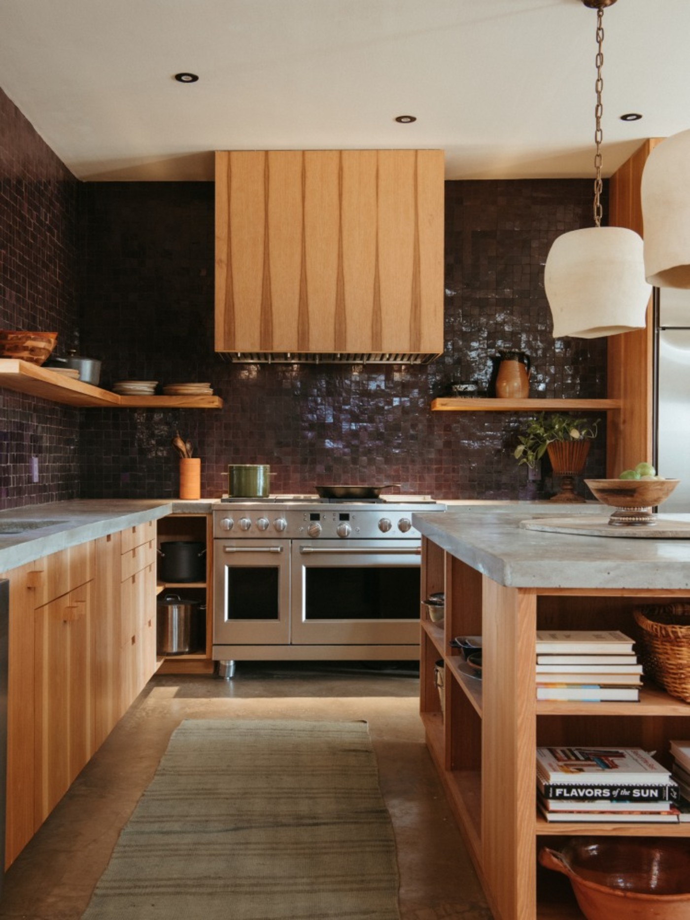 a kitchen with wooden cabinets.