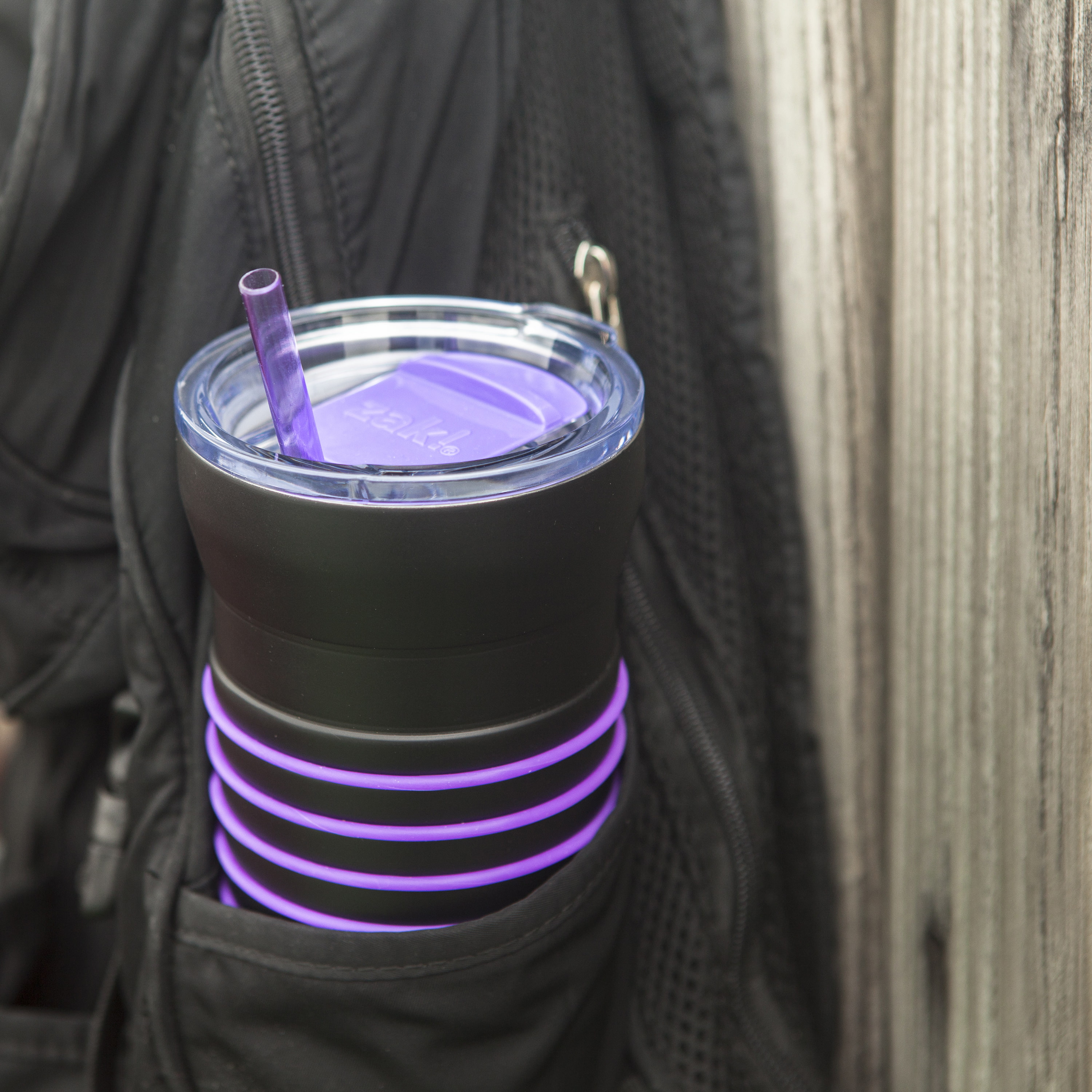 HydraTrak 20 ounce Vacuum Insulated Stainless Steel Tumbler, Black with Purple Rings slideshow image 4