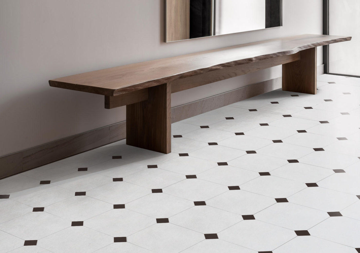 a white and black tiled floor with a wooden bench.