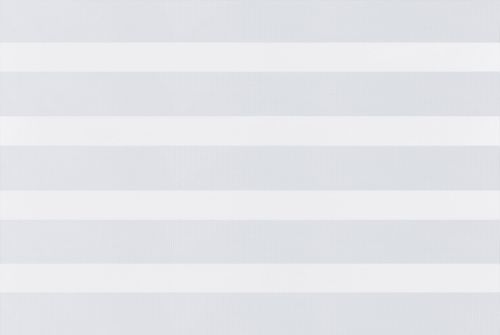 Horizontal zebra roller blind covering a window with alternating wide opaque and sheer bands, aligned to form stripes; filtering diffuse daylight across a neutral interior wall, creating soft gray-white pattern.