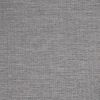 Gray woven roller blind, fully lowered and closed, filtering muted daylight; fills the frame, suggesting an interior window or wall with soft, even lighting and subtle horizontal weave texture.