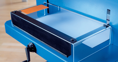 Safety shields and locking mechanisms keep fingers away from the blade.