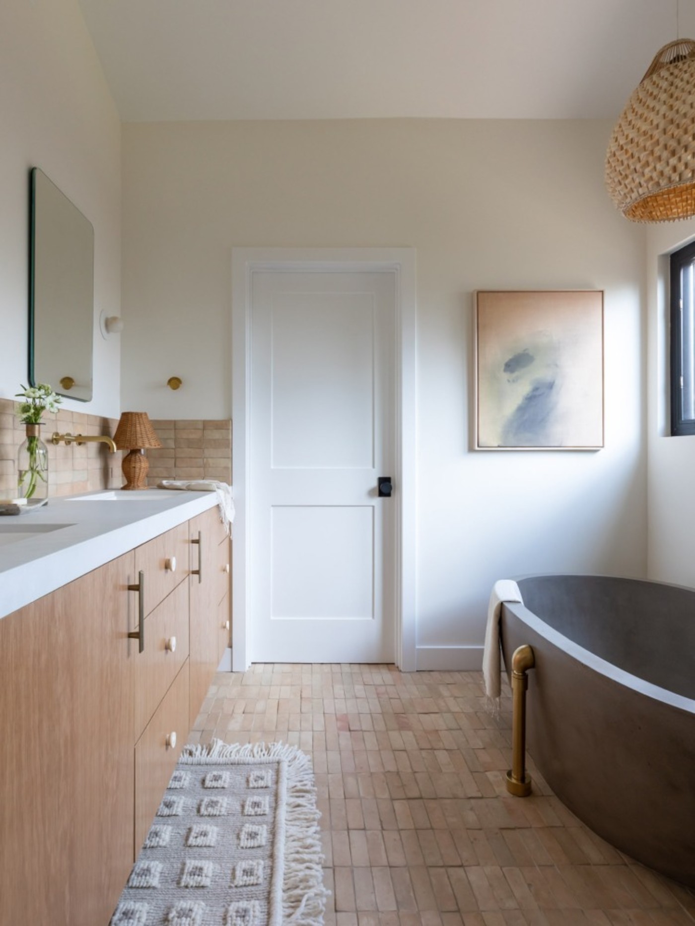 a bathroom with a tile floor.