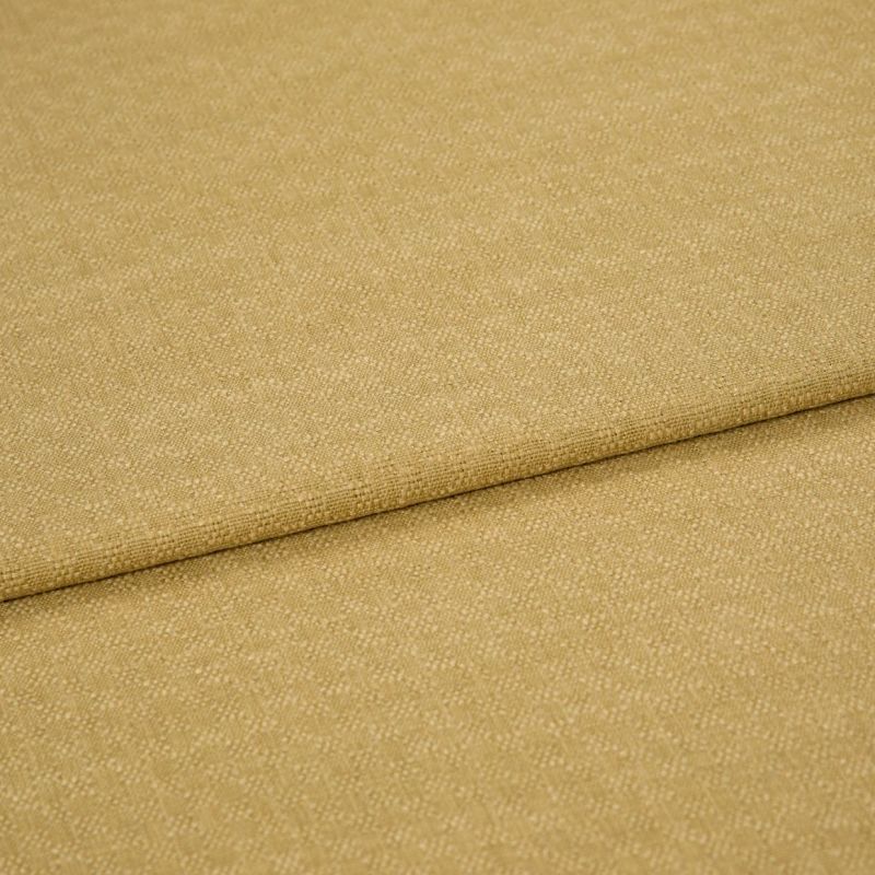 Beige woven fabric with fine pebble texture, folded once creating a horizontal overlap; close-up studio product shot with soft, even lighting showing fabric surface and seam detail.