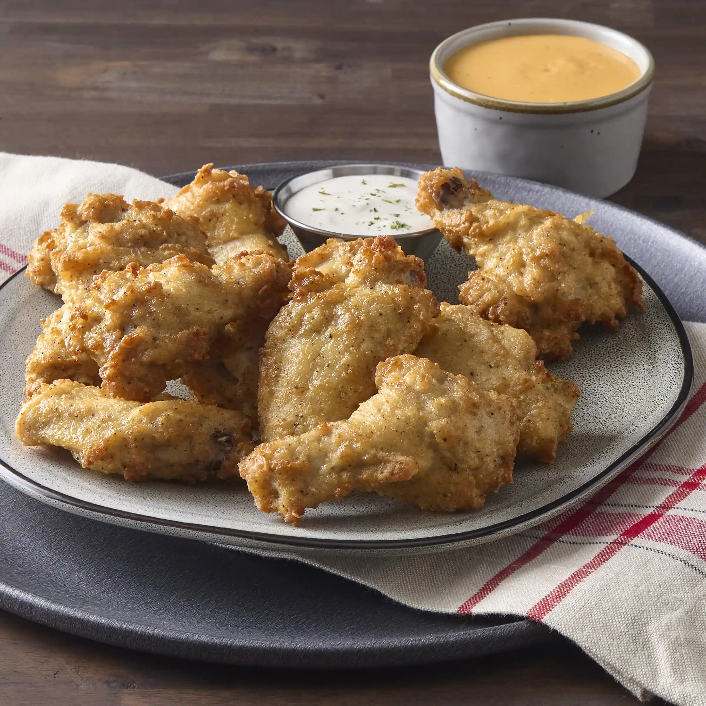 Tyson® W.W. Flyers® Fully Cooked Breaded Bone-In Chicken Wing Sections, Small_image_1