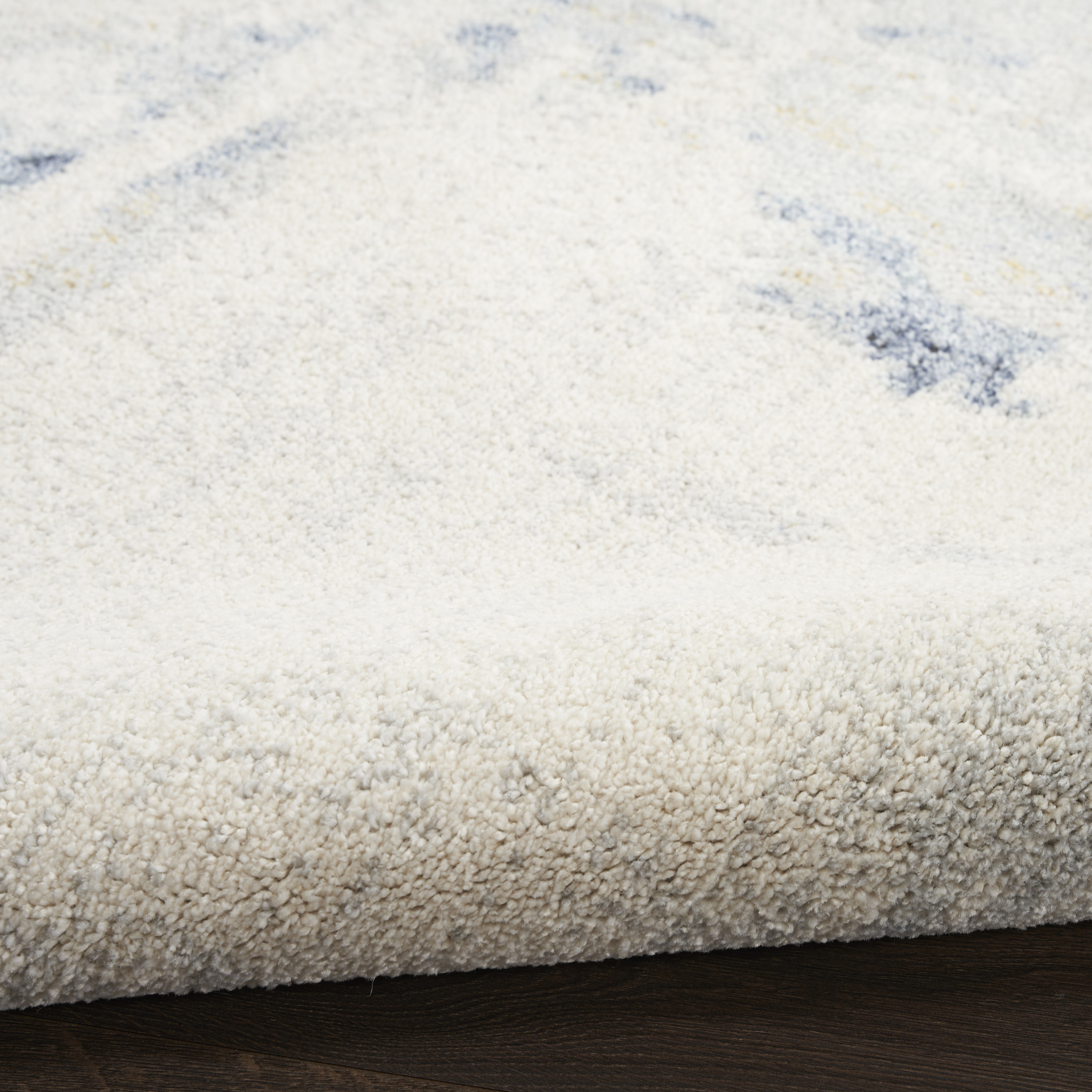 Nourison Motion 5'3" x 7' Ivory Blue Modern Indoor Rug