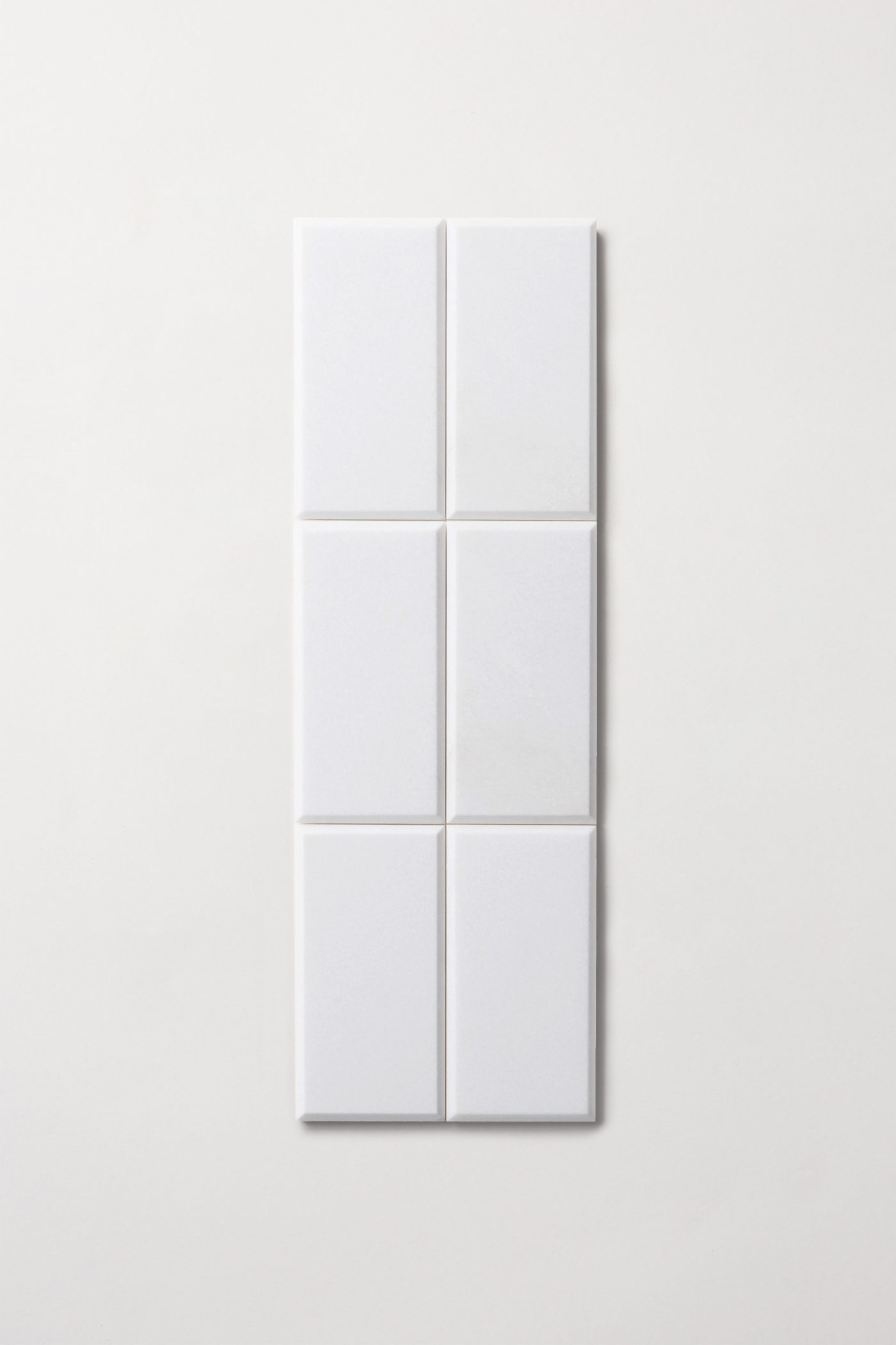 six white rectangle tiles on a white background.