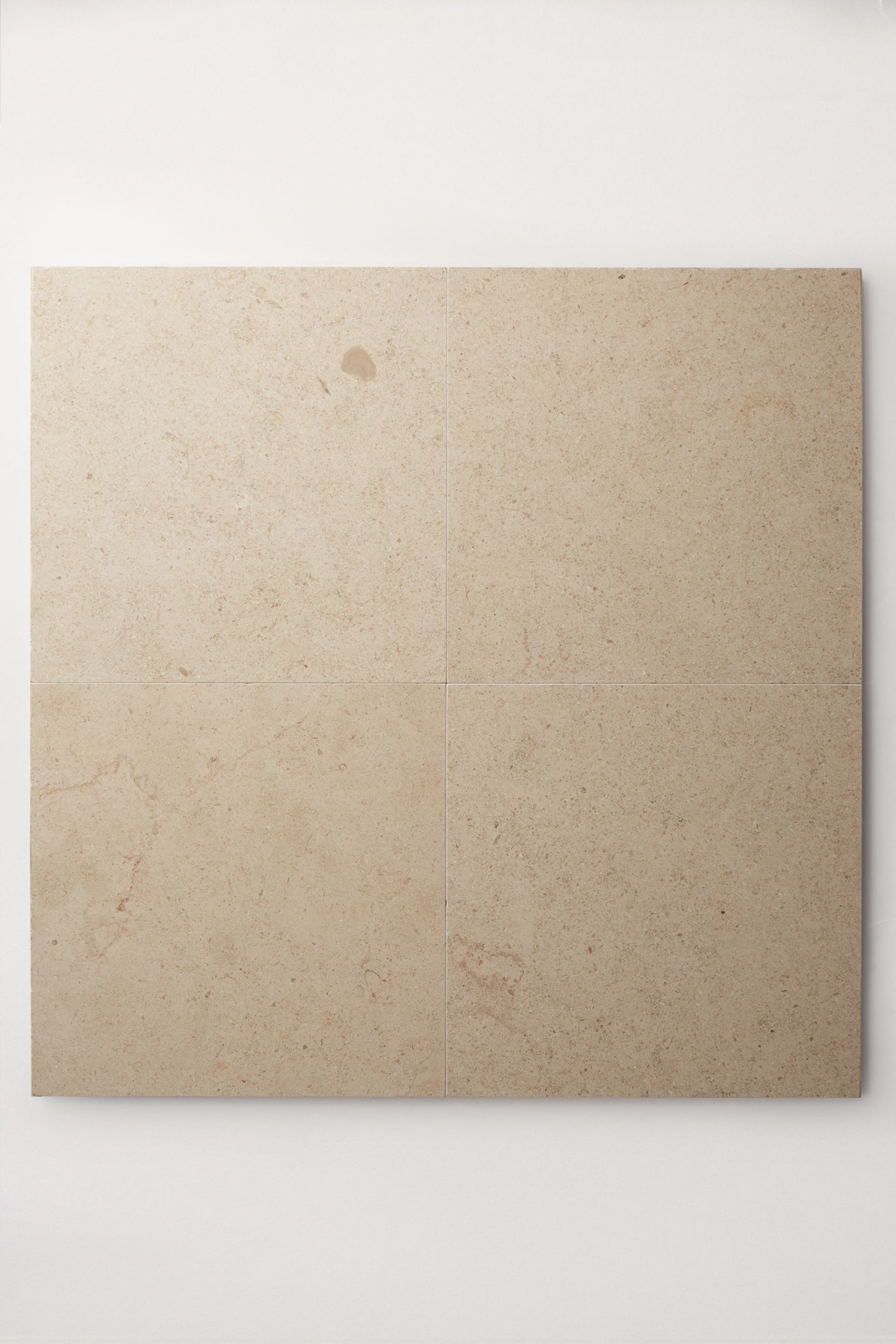 a beige tile on a white background.