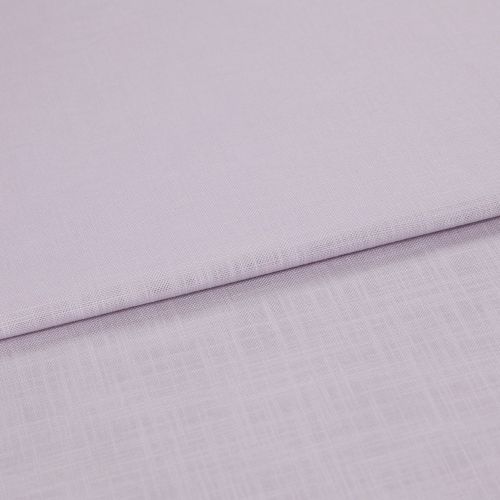 Pale lavender linen fabric folded across the frame, edge running diagonally; resting in soft layers, close-up on fine woven texture under diffuse lighting.