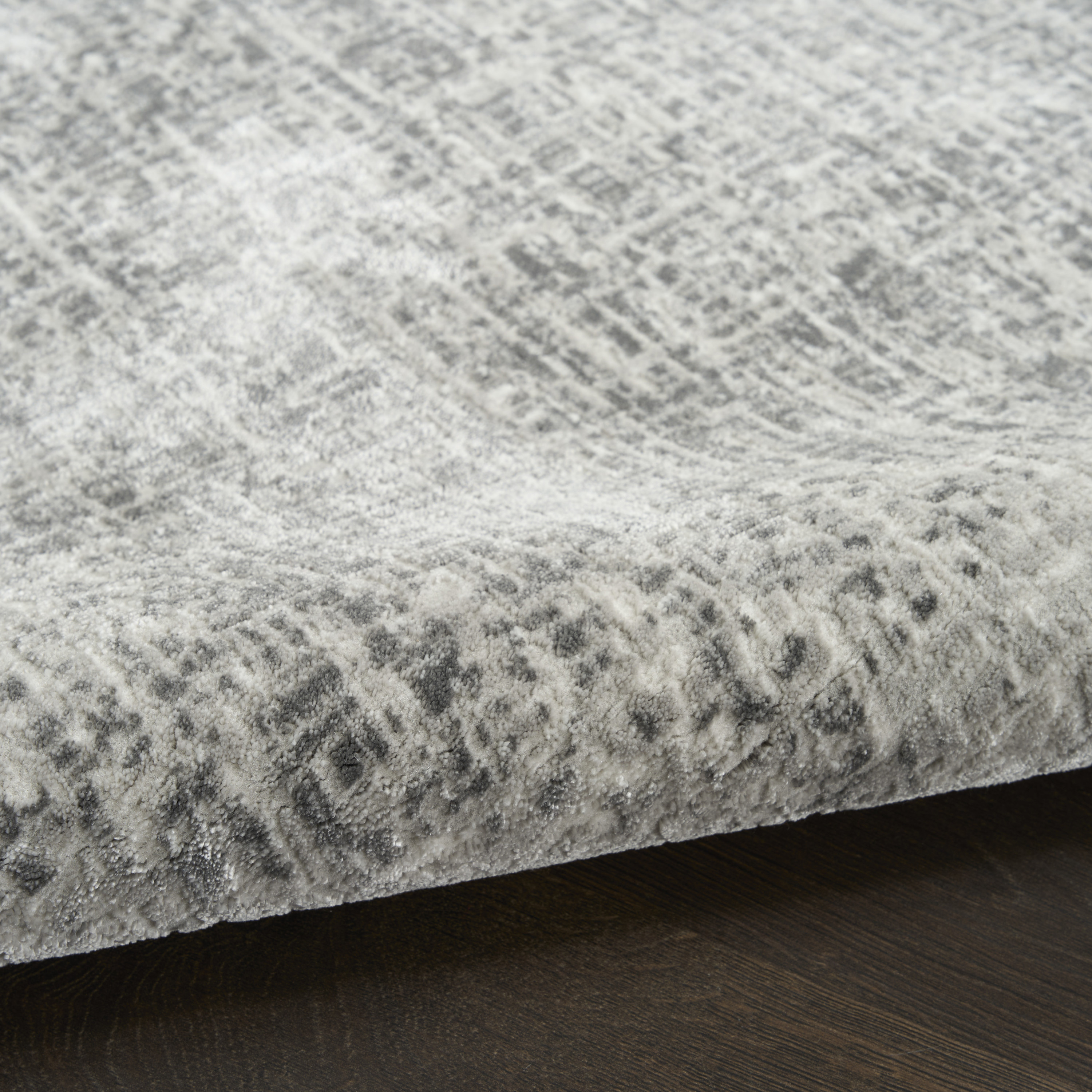 DKNY Grand Street 9' x 12' Light Grey Modern Indoor Rug