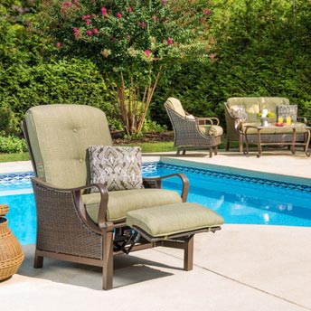Photo of a patio chair outisde by the pool.