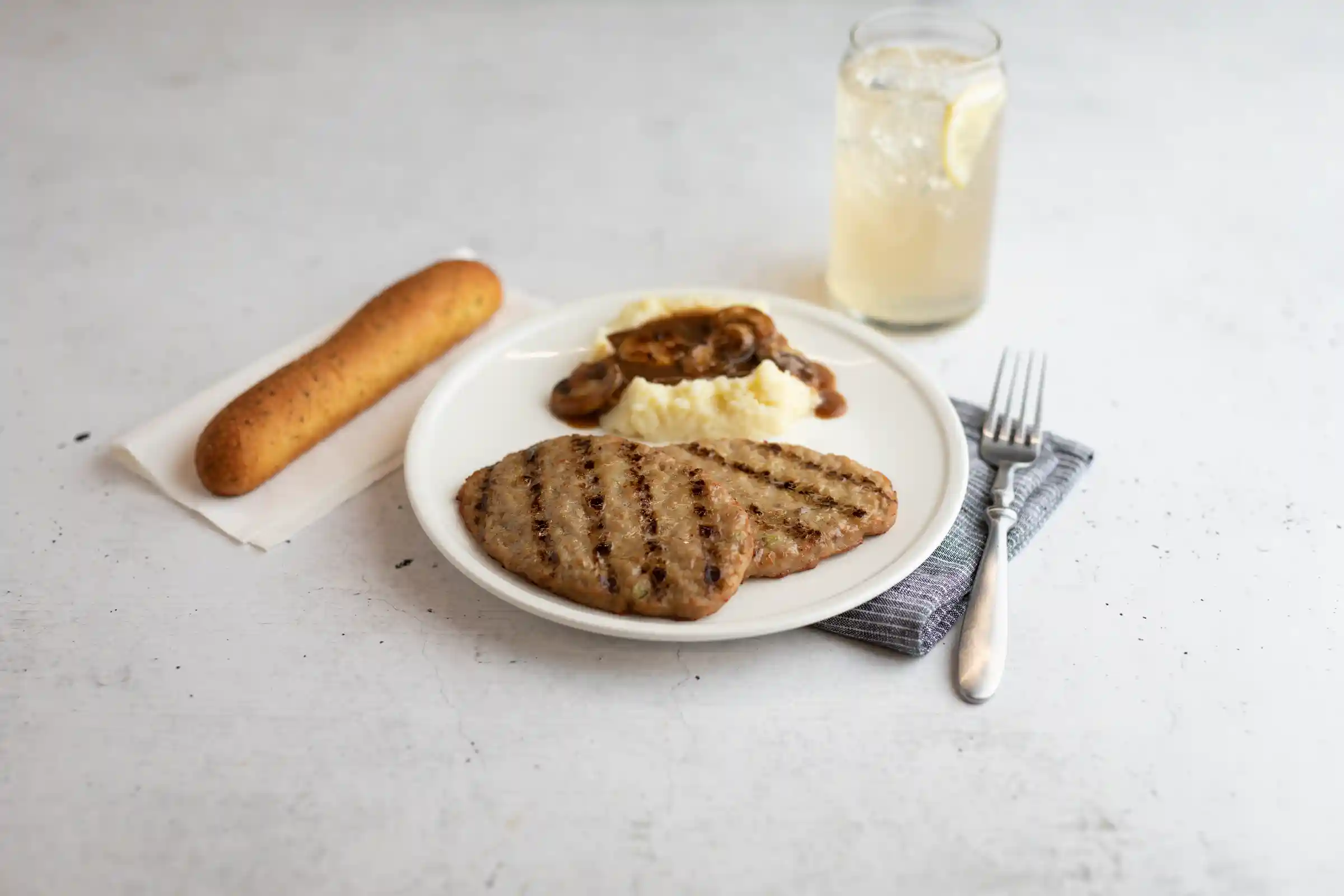 AdvancePierre® Fully Cooked Down Home Charbroil Beef Salisbury Steak, 2.7 oz. https://images.salsify.com/image/upload/s--FmXa-zpy--/q_25/lp38b4xson9shhgz9oqc.webp