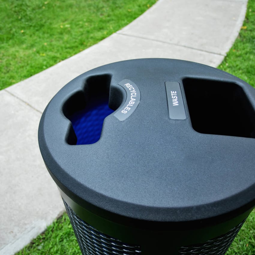 closeup view of a double stream waste and recyclables collection container showing the durable LDPE lid and restrictive openings