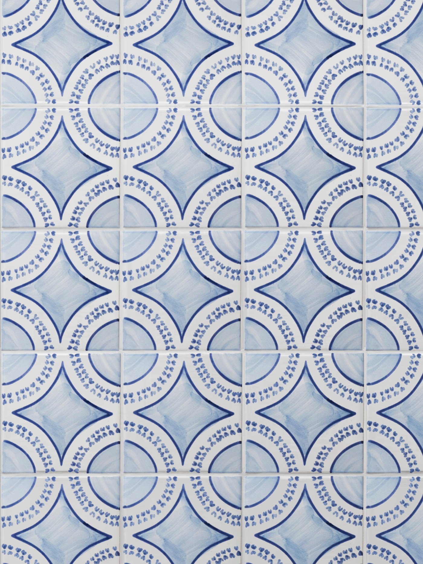 blue and white tiles with a circular pattern.