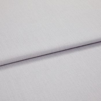 Light grey woven fabric panels overlapping in a folded horizontal seam, showing fine texture and tight weave; close-up, soft even lighting on a neutral surface.