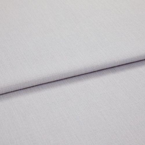 Light grey woven fabric panels overlapping in a folded horizontal seam, showing fine texture and tight weave; close-up, soft even lighting on a neutral surface.