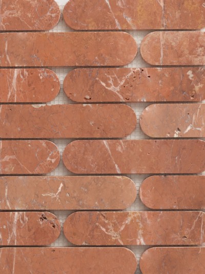 a close up of a red brick wall.