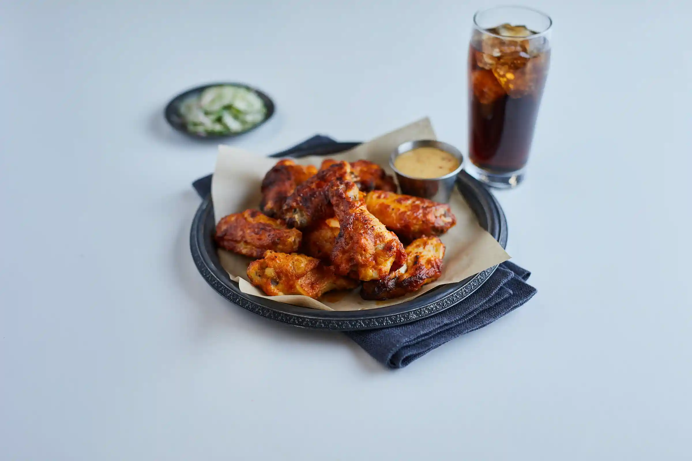 Tyson® Wings of Fire® Fully Cooked Glazed Bone-In Chicken Wing Sections, Small https://images.salsify.com/image/upload/s--6pOG62uB--/q_25/c475833b4e054a0f460034ff0f0a0a90a10f12be.webp