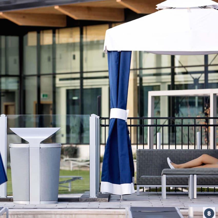 outdoor trash and recyclables bin made from durable steel and LDPE plastic at a high-end resort