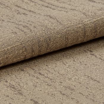 Rolled beige woven fabric with subtle darker linear pattern, folded at the edge — resting on a matching fabric surface in a close-up, softly lit studio shot emphasizing texture.