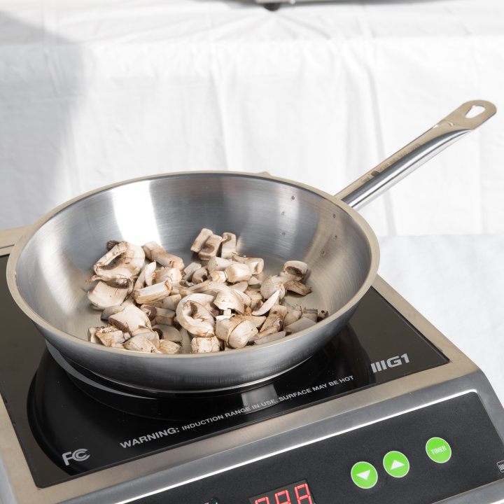 9 ½-inch Optio™ fry pan with natural finish