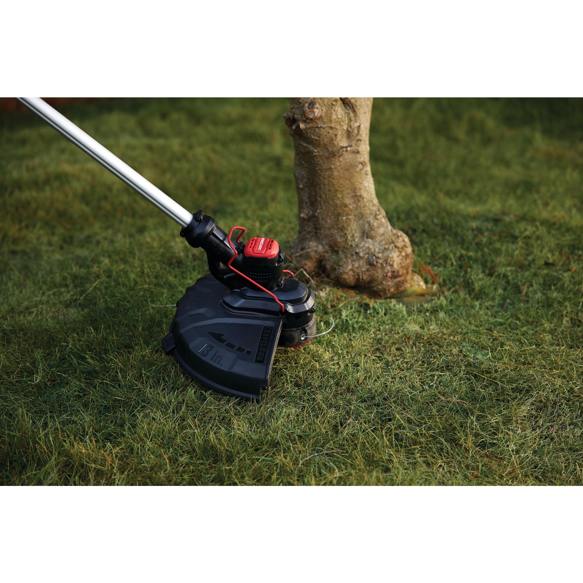 13 inch cutting swath feature of 20 volt weedwacker 13 inch cordless string trimmer and edger with automatic feed kit 2.0 ampere per hour.
