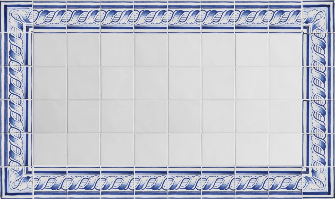 blue and white tiles arranged in an ornamental border pattern.