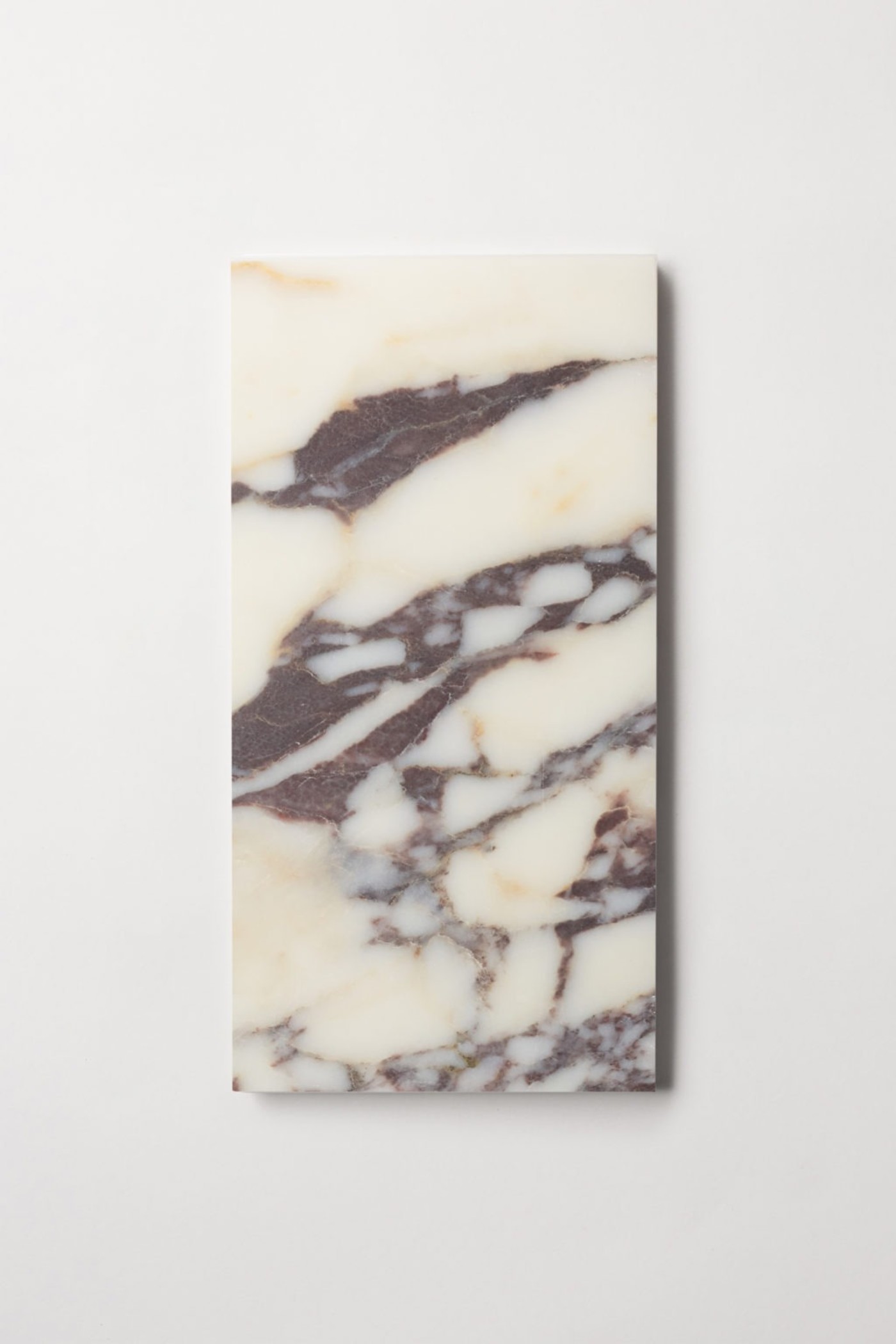 a piece of marble on a white surface.