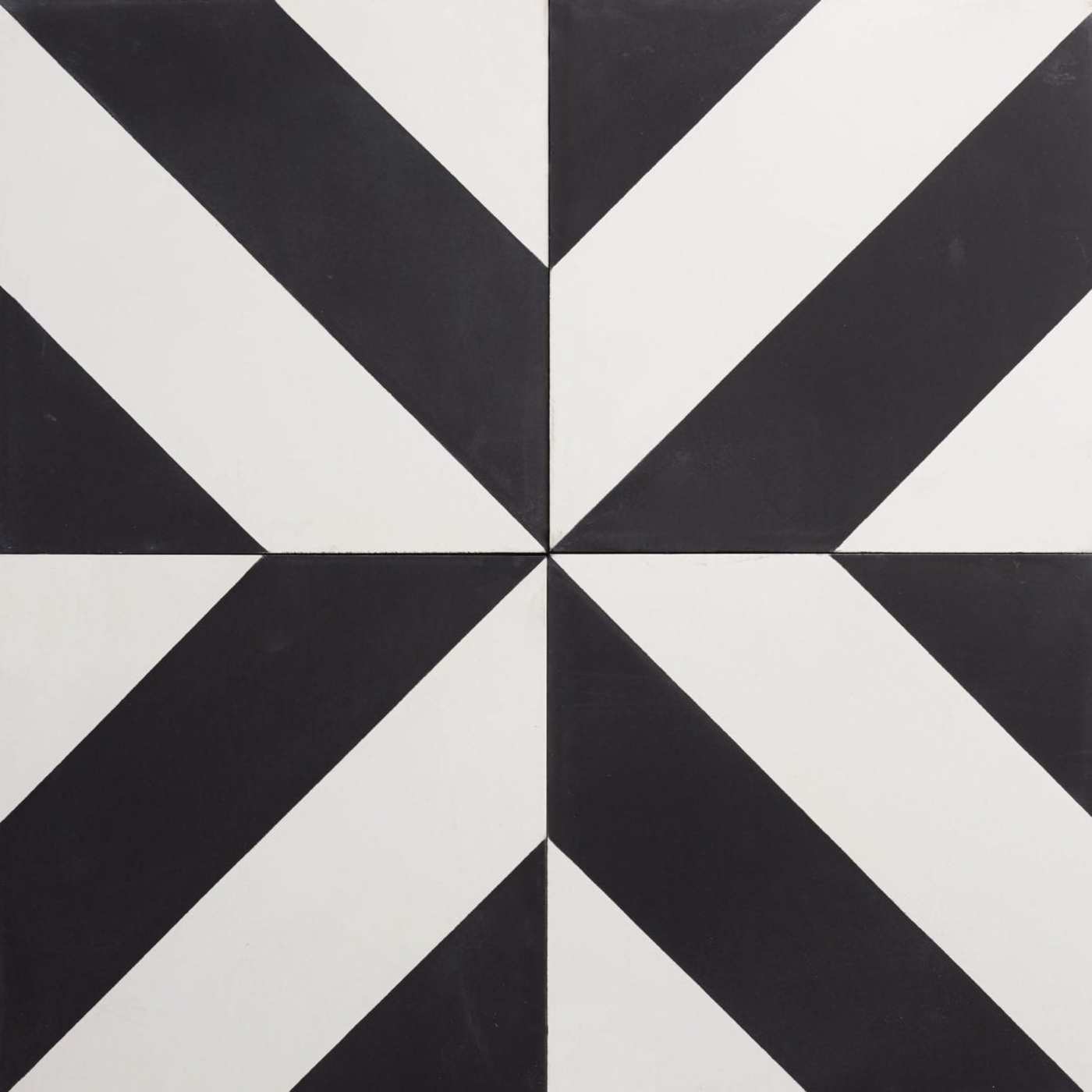 four black and white tiles with stripes.